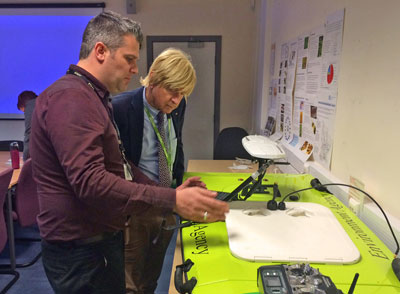 Photos show Michael with one of the Agency’s remote controlled boats